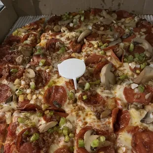 Specialty pizza with thick garlic crust