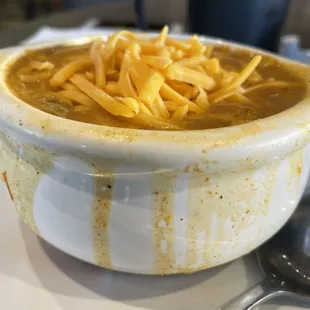 Soup spilled over the bowl and then microwaved.