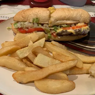 Cheeseburger sub with steak fries.
