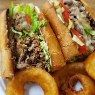 Steak and  provolone cheese fully loaded (mayo, fried onions LT), onion rings