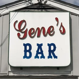 a sign for gene's bar