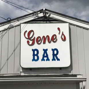 a sign for gene's bar