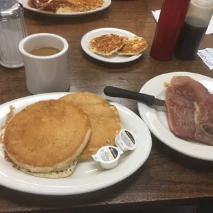 a breakfast of pancakes and bacon