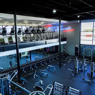 Our cardio deck overlooks the strength training equipment.
