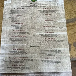 Menu. Look at the prices.