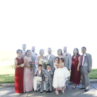 Family photo taken by Genevieve. I asked her to fix and she said there was nothing wrong with the photo?