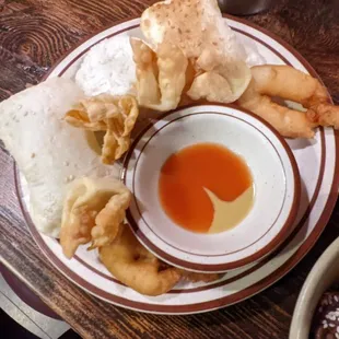 a bowl of soup and a plate of food