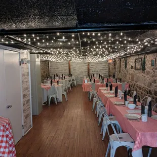 shows a dining room with tables and chairs