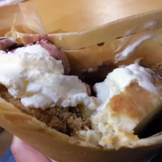 17. Cheesecake, Whipped Cream and Blueberry Sauce