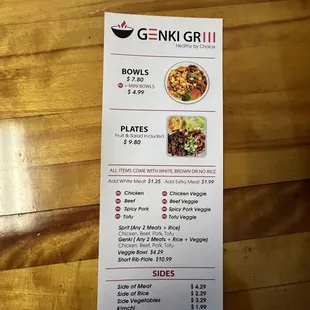 a menu on a wooden table