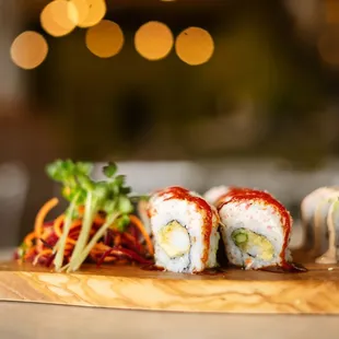 a sushi roll on a cutting board