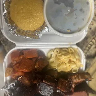 2way plate: half of chicken and ribs sides: Mac &amp; cheese, greens and yams Sweet cornbread