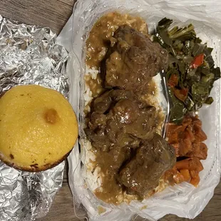 Oxtail, candied yams, collards