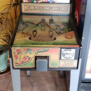 an old style pizza parlor machine