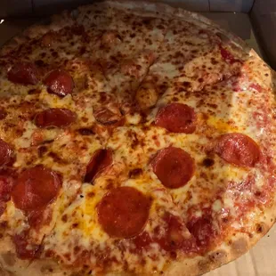 Pizza half cheese and half pepperoni