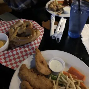 a plate of fried fish and fries