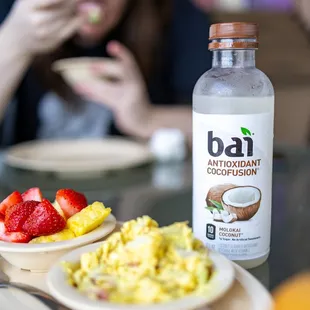 a woman eating breakfast
