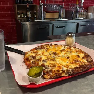 Geno's Bacon Cheeseburger Pizza, Eau Claire, Wisconsin. A must stop.