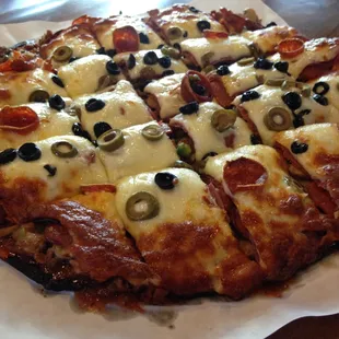 The "Big Geno" Try the challenge and eat the 5 pounder in a half hour or less, with soda and receive a $50 gift card.