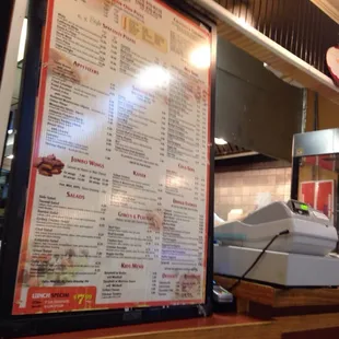 Greasy and dusty menu should get wiped down