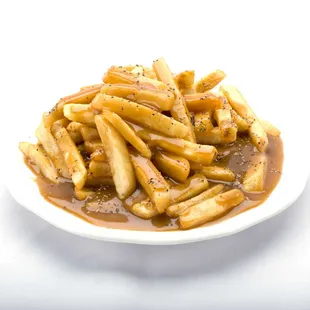 A plate of Genova&apos;s To Go gravy fries - a delicious combination of french fries with gravy and sauce. Yum!