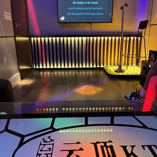 a stage with a large screen
