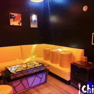 a couch, coffee table, and television