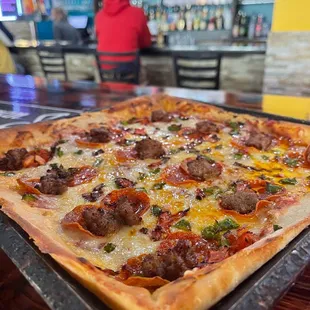 Pepperoni, sausage, and green peppers pizza!