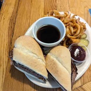 a steak sandwich and fries