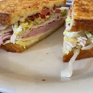 a cut in half sandwich on a plate