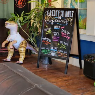 a t - rex and a chalkboard