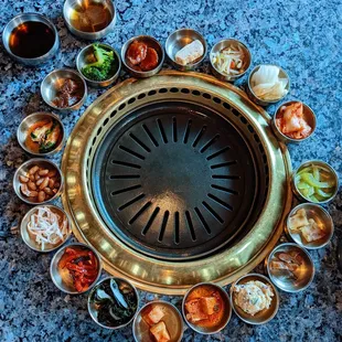 a grill with many different types of food