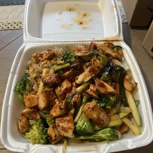 Spicy chicken with garlic fried rice and vegetables