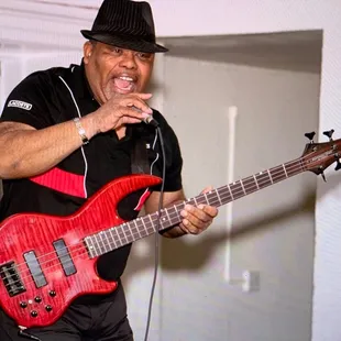 a man with a red guitar