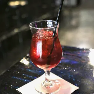 a drink with a straw in a glass