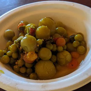 Pickled tomatoes and peas
