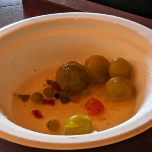 Pickled tomatoes and peas
