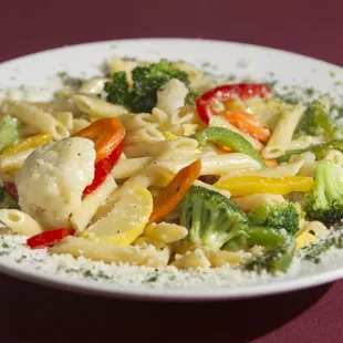 a plate of pasta and vegetables