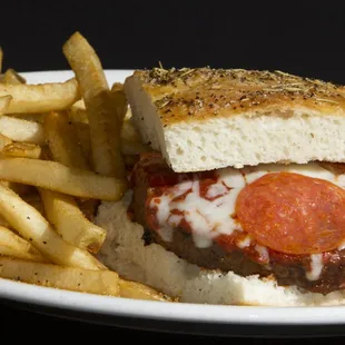 a meatball sandwich and french fries