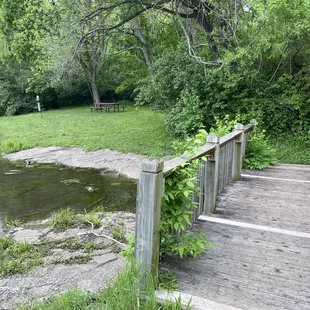 Small bridge to lakeside picnic area
