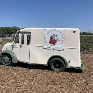 a truck with a banner on it