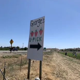 a sign for george's pick