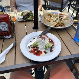 Wedge salad, veggie salad and nachos with grilled chicken - yum!