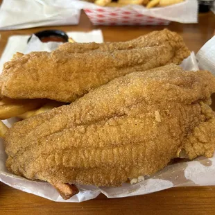 Two catfish fillets and four colossal shrimp! This came hot out of the grease and it was delicious!