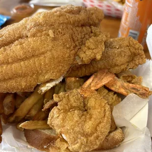 The colossal shrimp are huge. And you get to complete catfish fillets when you order two fillets and four shrimp.