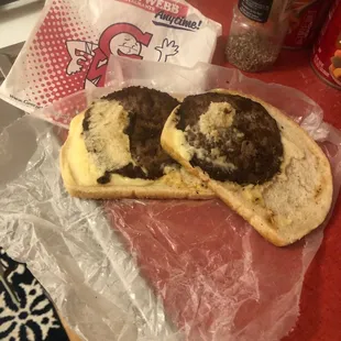 a sandwich with meatballs and cheese