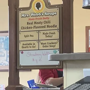 a man working at a restaurant counter
