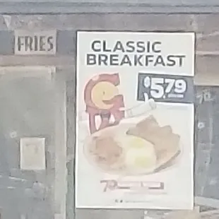 a poster in a window of a restaurant