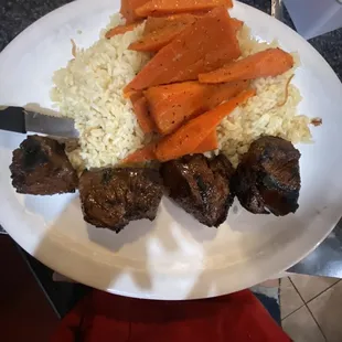 Filet mignon with just carrots and rice pilaf