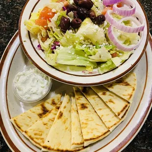 Greek salad with tzatziki sauce and pita bread!